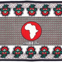 Kanga in red, white, black and green, with the outline of Africa in the centre in a red circle.