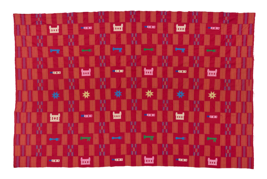 red kente with colourful woven motifs