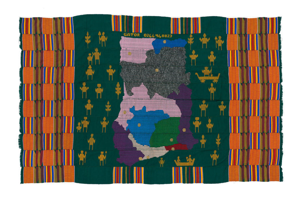 a colourful woven cloth which features a map of Ghana