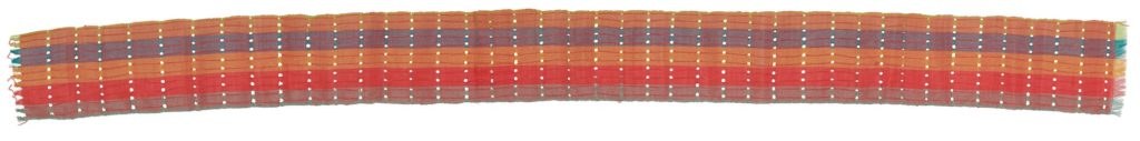 A strip of handwoven aso-oke cloth in stripes of coral, red and purple