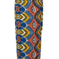 A woman's long pencil skirt made of blue, yellow, white and coral wax print fabric