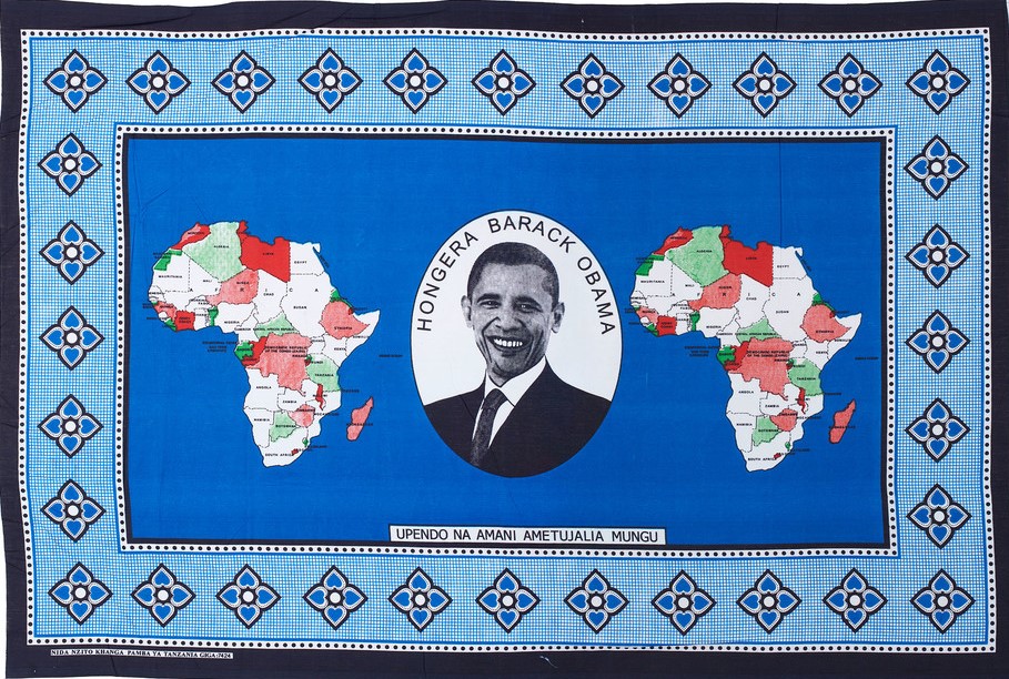 Blue kanga cloth featuring a portrait of Barack Obama and two maps of Africa.