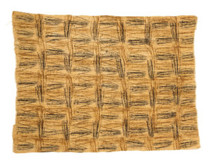 Beige textile with a check design made up of many scrawled black and brown lines.