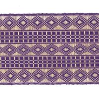 detail of purple aso-oke fabric with diamond and windowpane check designs