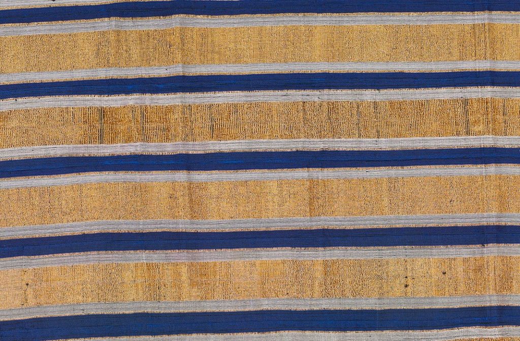 stripwoven aso-oke fabric in stripes of gold white and blue