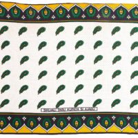 Kanga with indigo border with green and yellow feather motif and yellow scallops with indigo spots, white central panel with indigo spots and green and yellow feather motifs.