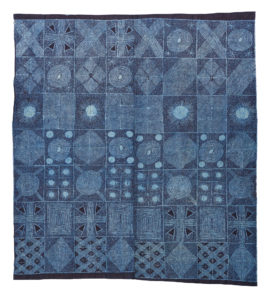 a dark blue cloth with geometric patterns created
