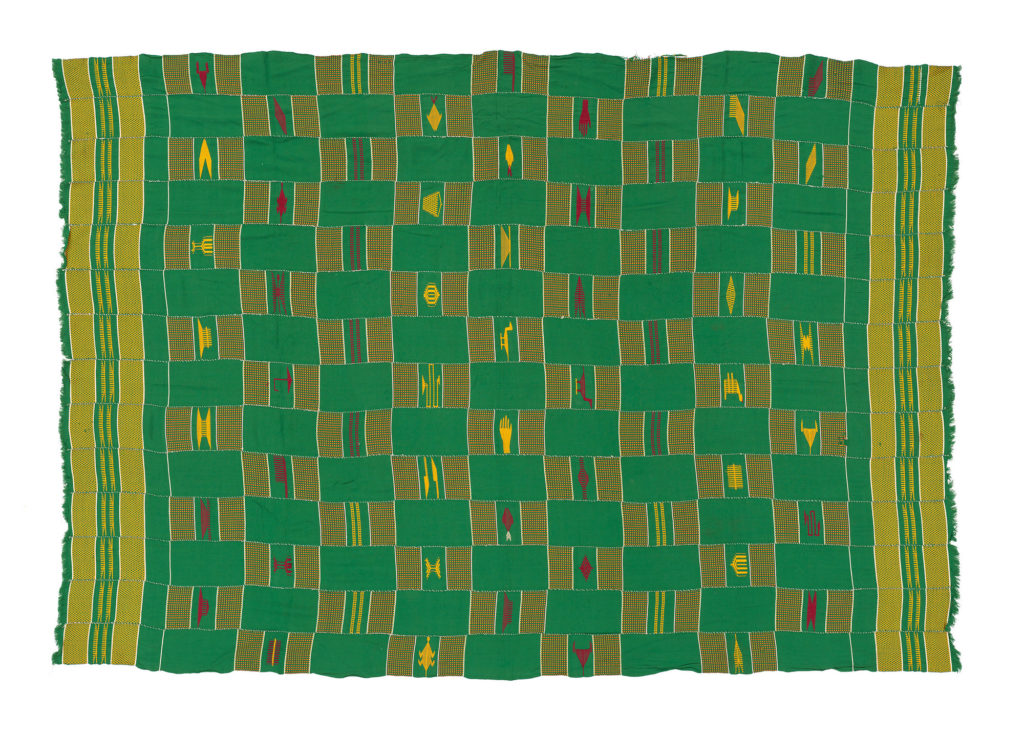 green kente cloth with designs in red and yellow