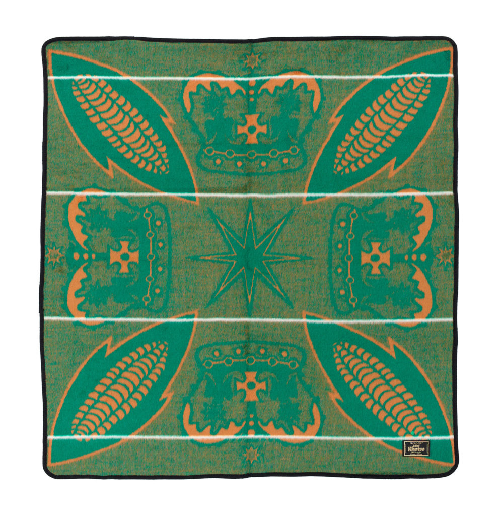 square green and yellow basotho blanket with a design of corncobs and crowns