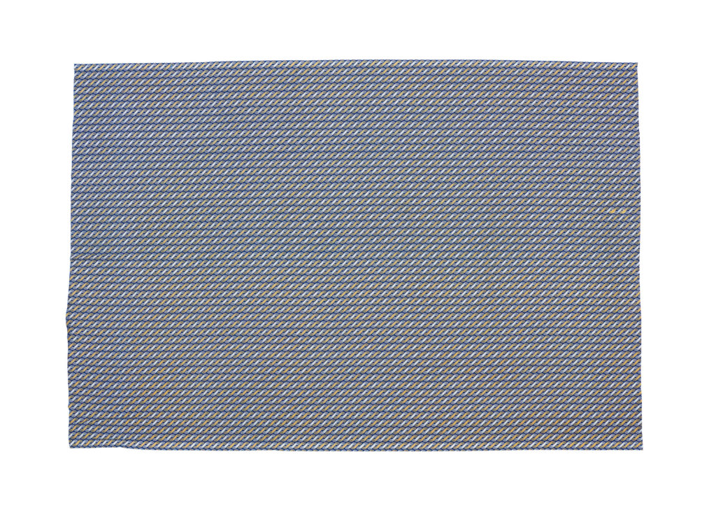 Piece of shweshwe fabric, indigo, white and yellow twist design, from the 'fancy print' series.