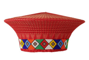 Red women's isicholo flared hat with brightly coloured beadwork around the band