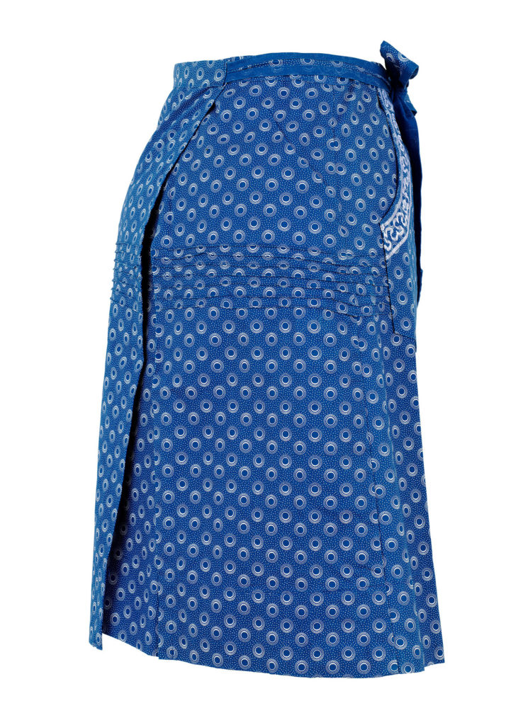 Side view of blue and white shweshwe wrap skirt