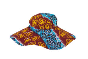 Woman's hat with a wide brim made of wax print fabric, blue and maroon with yellow flower motif.