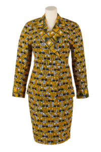 Woman's skirt suit in two contrasting patterns in ellow black and white wax print