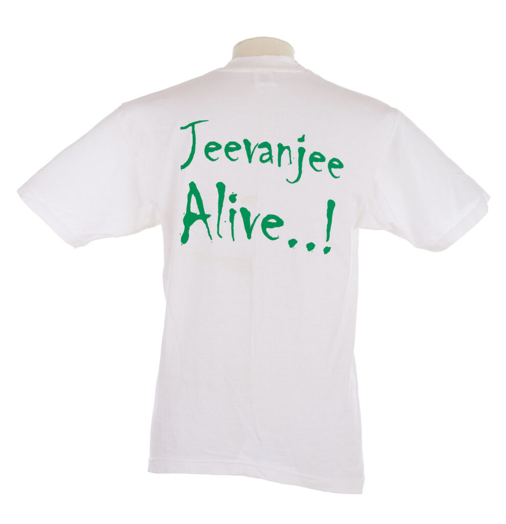 White T shirt with Jevanjee Alive on the back
