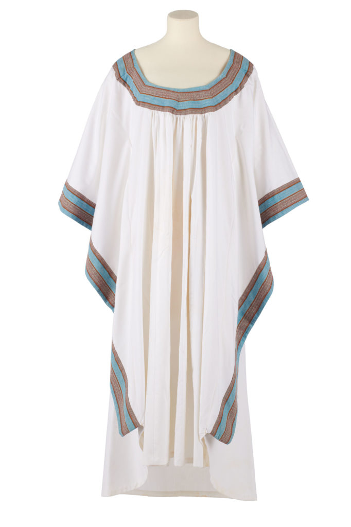 White cotton kaftan with coloured trim on neck and cuffs.