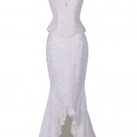 Woman's wedding outfit of white African lace bustier and mermaid skirt