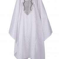 Man's robe and trousers in a white fabric woven with geometric designs and a silver metallic trim.