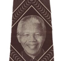 brown and white shweshwe precut skirt panel featuring Nelson Mandela